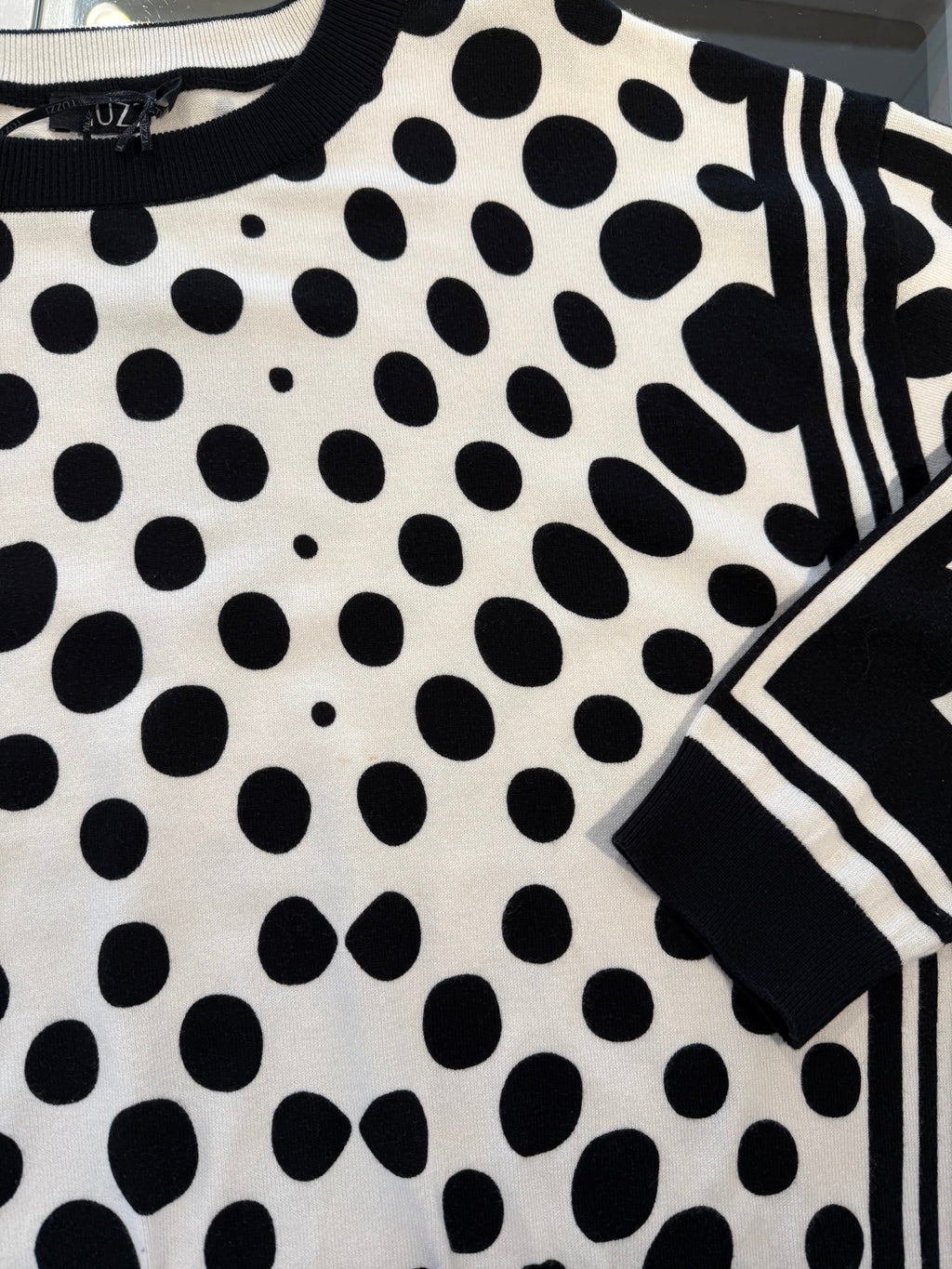 Black & White Top with Polka Dot Design and Side Stripes