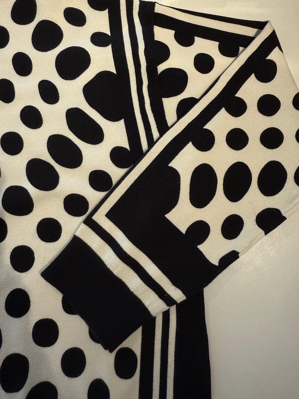 Black & White Top with Polka Dot Design and Side Stripes