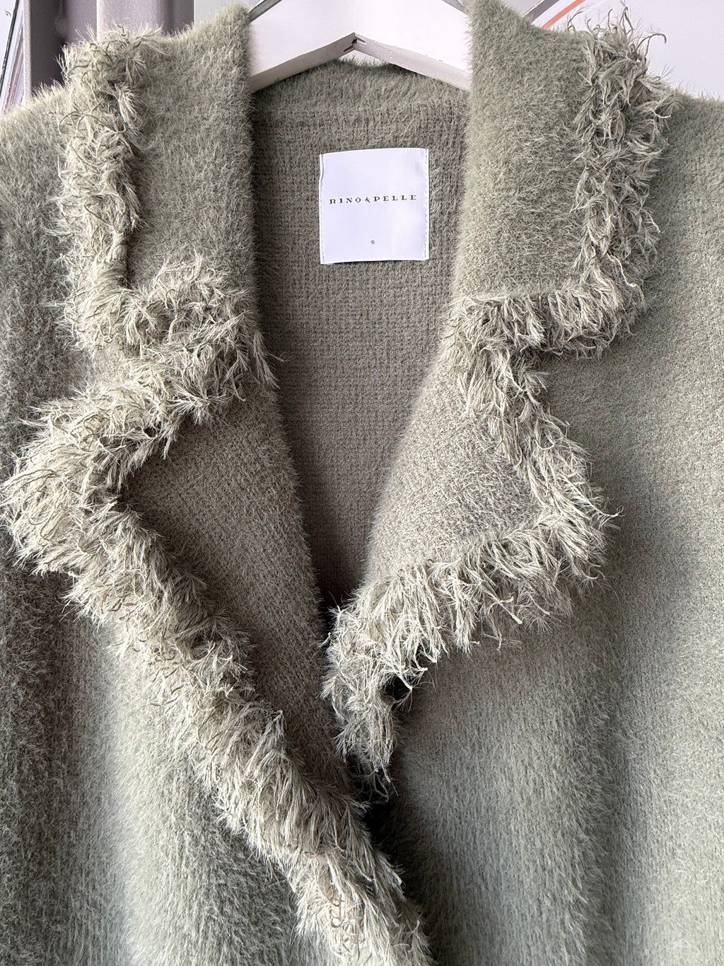 Single breasted cardigan with fringes