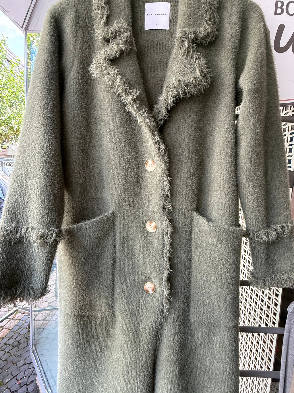 Single breasted cardigan with fringes