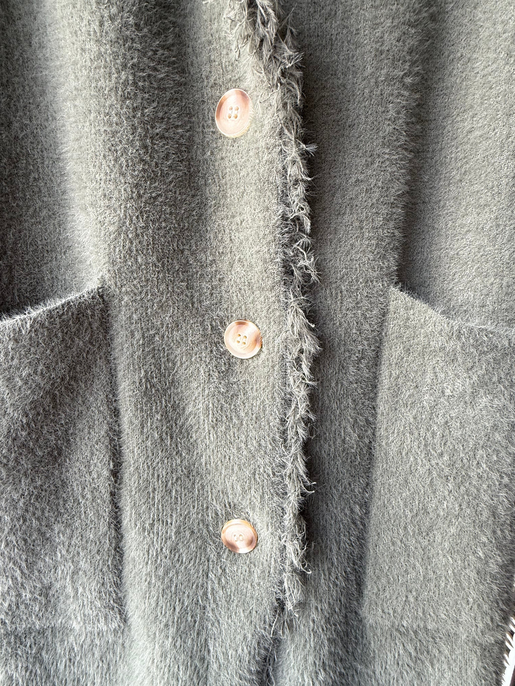 Single breasted cardigan with fringes